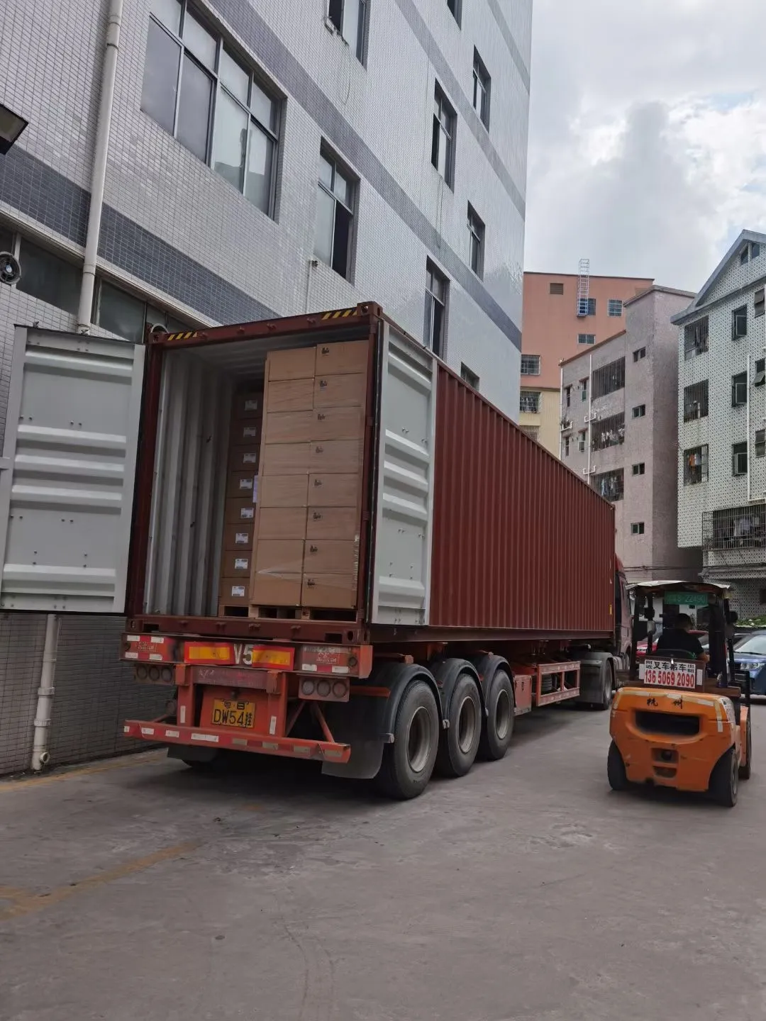 Wholesale digital cameras packed and loaded into a container for export